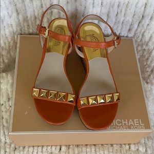 Michael Kors leather wedge sandal.
